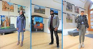 Drei junge Erwachsene stehen in einer Ausstellung