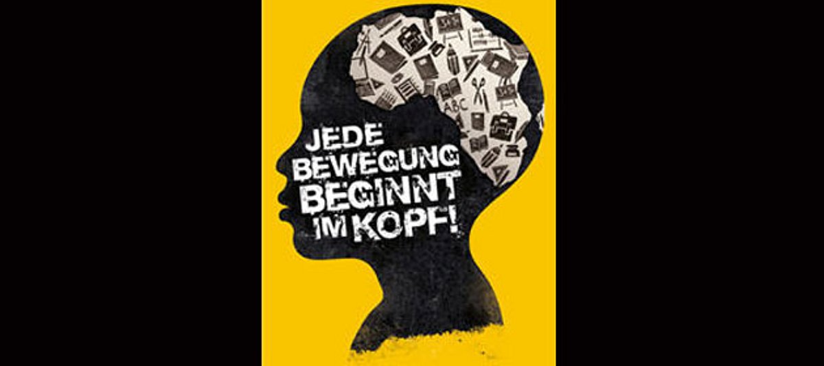 Kopf mit der Inschrift des Mottos der Aktion Tagwerk 2013 "Jede Bewegung beginnt im Kopf"